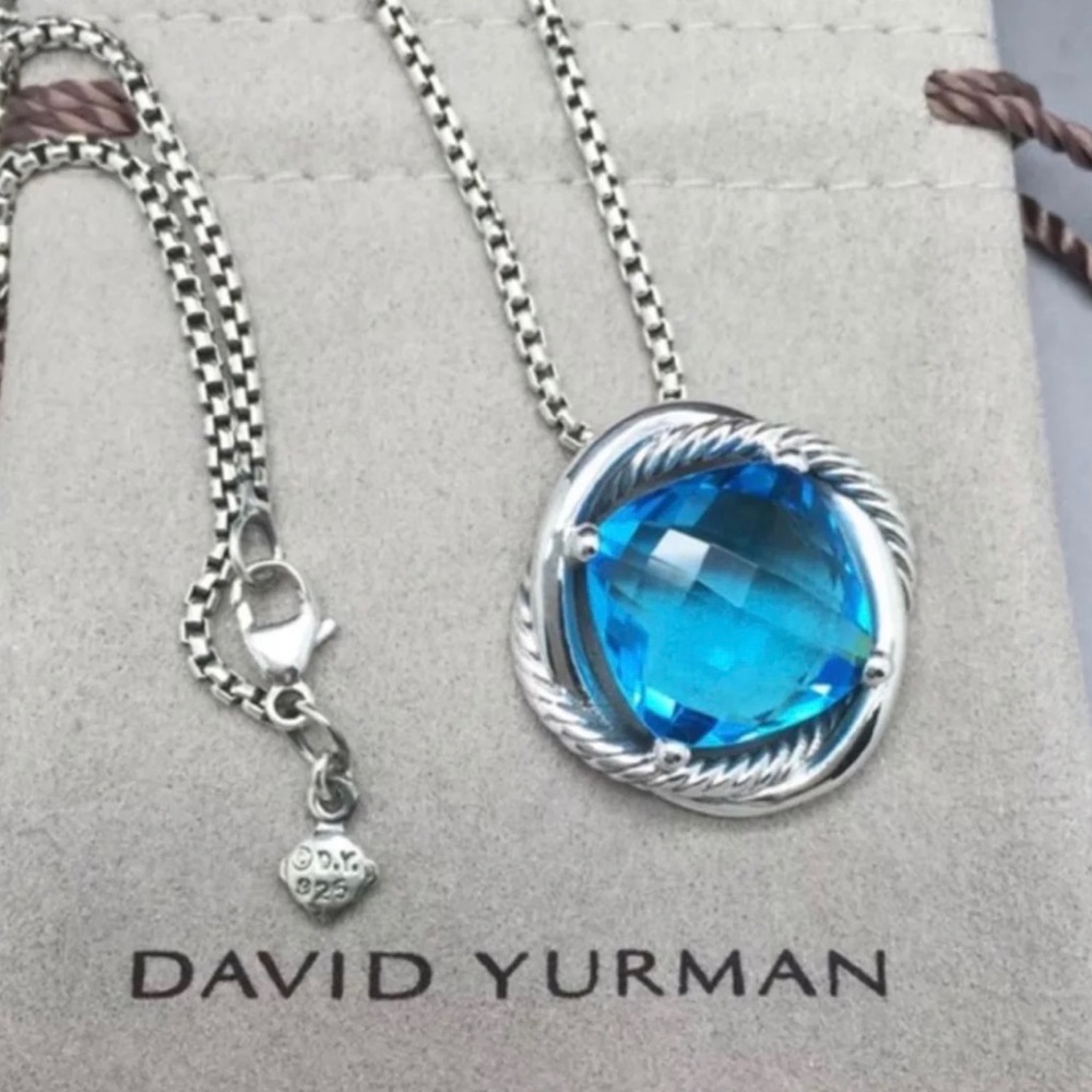 DY SILVER INFINITY PENDANT WITH BLUE TOPAZ